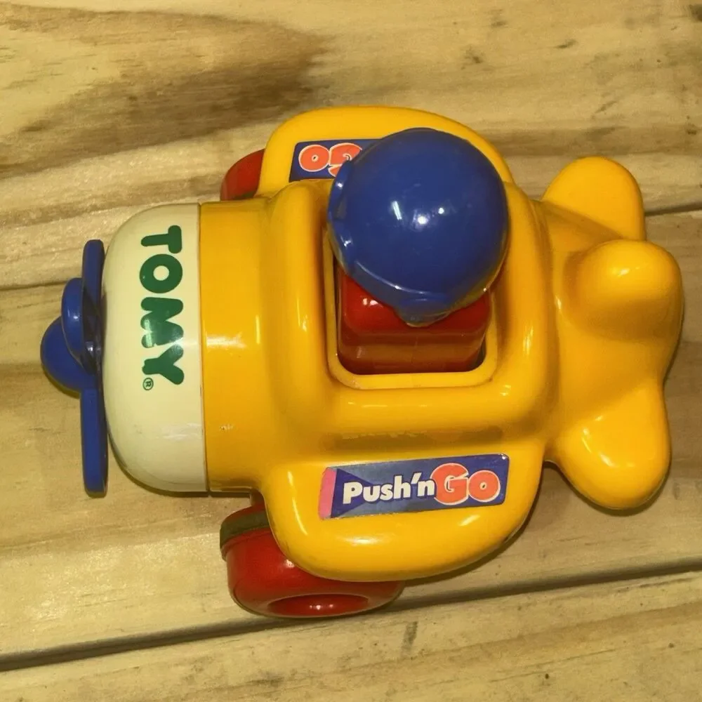 Vintage 1991 Tomy Push N Go Airplane Toy Baby Einstein Moving Pilot Yellow Works